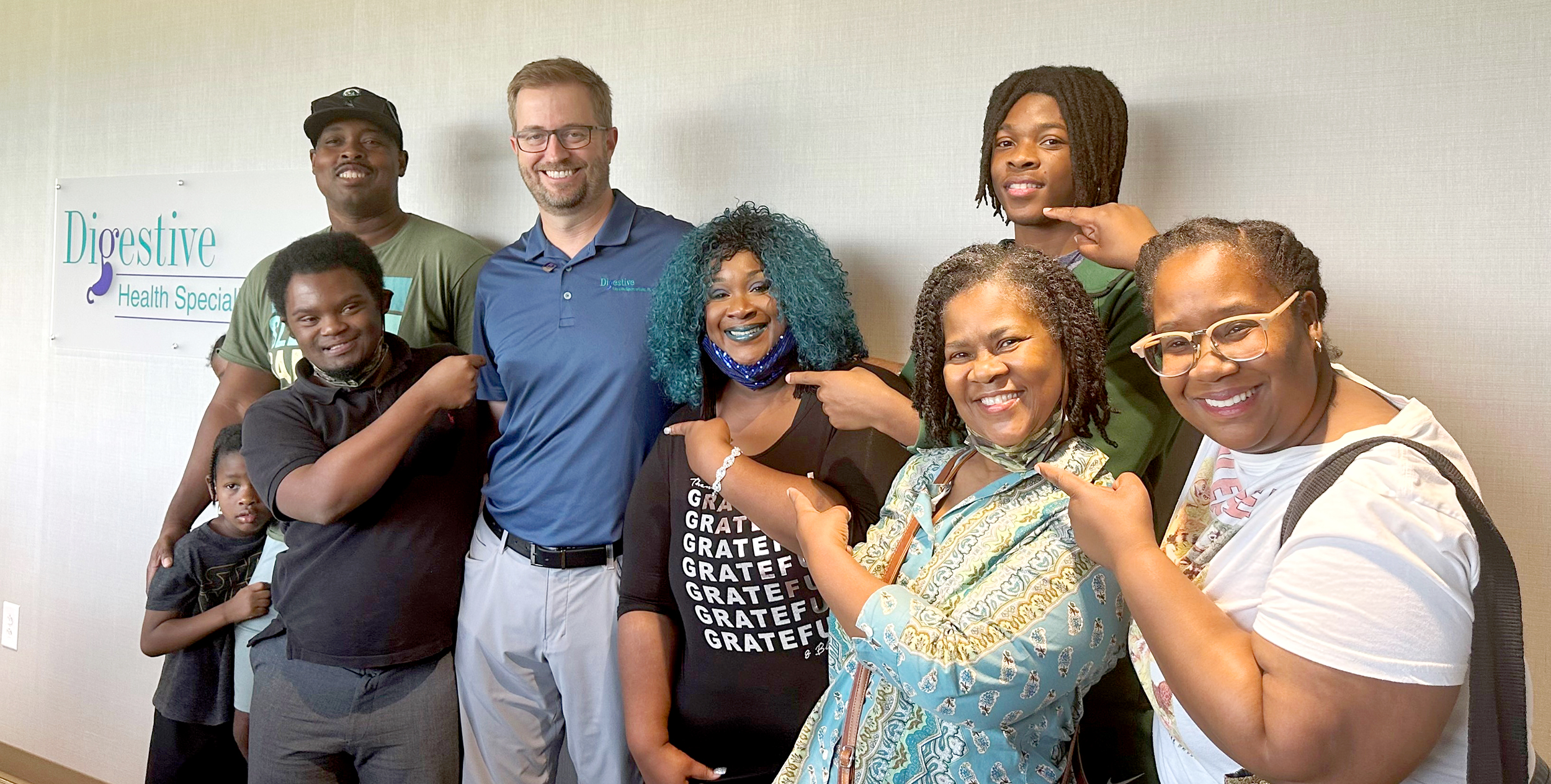 Tammy Joina and family with Dr. David ramsay at the novant health guardian angel pinning ceremony